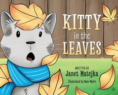 Kitty in the Leaves