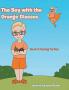 The Boy with the Orange Glasses