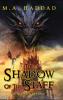 THE SHADOW OF THE STAFF