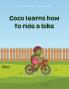 Coco learns how to ride a bike