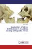 Evaluation of stress distribution in mandible during orthopedic forces